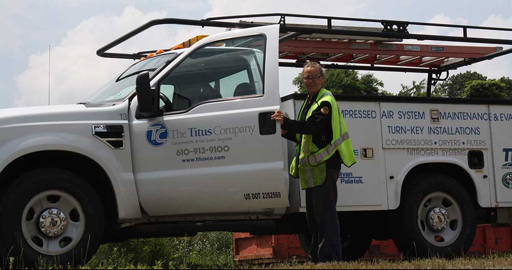 Titus Company employee getting ready to leave for a client project