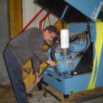 Joe working on an air compressor system