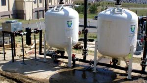 Two deliquescent air dryers at a landfill