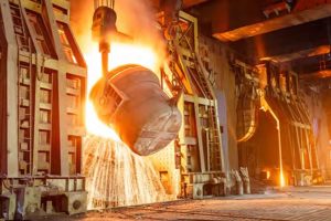 Molten metal being poured in a metal plant